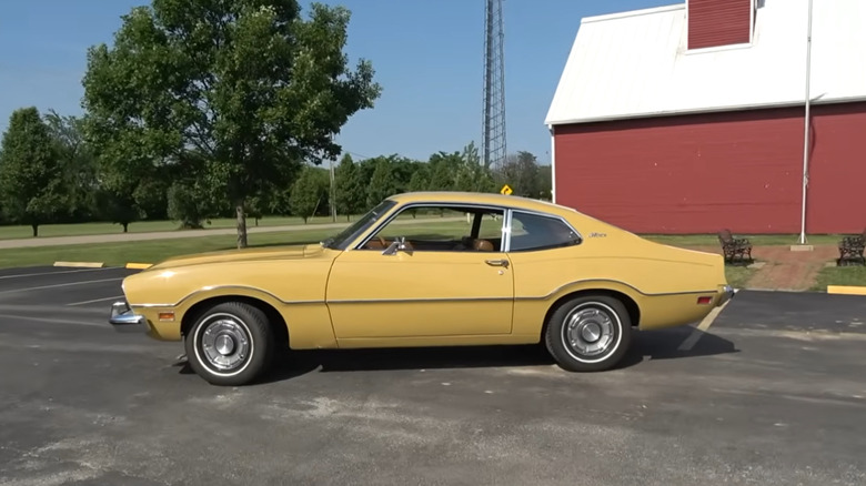 Driver's-side profile of 1973 Ford Maverick V8 2-door in Light Goldenrod