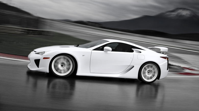 A white Lexus LFA on a wet racetrack