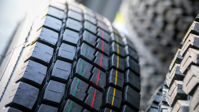 New truck tires inside a warehouse