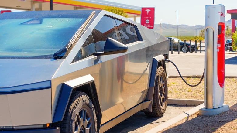 A Tesla Cybertruck at a Tesla Supercharging station.