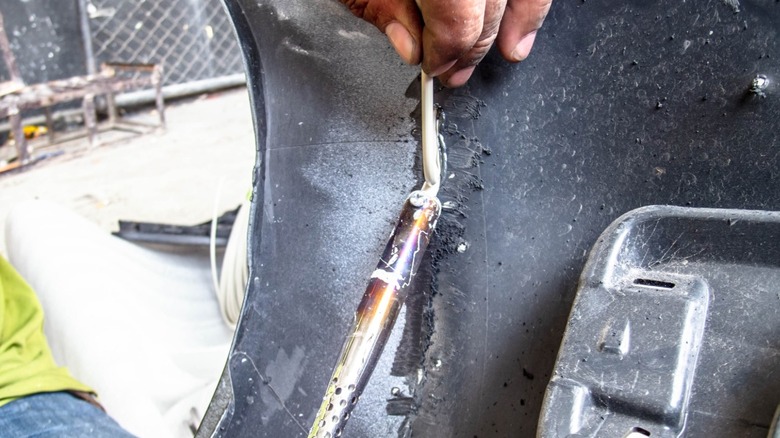 Using plastic welder to fix bumper