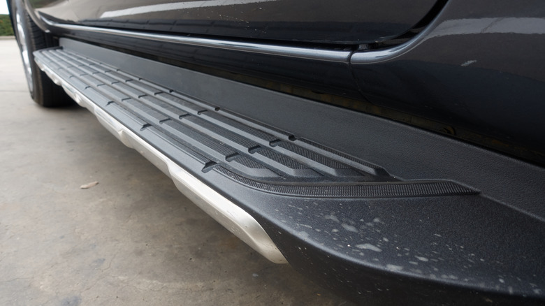 Close-up view of a side step of an SUV