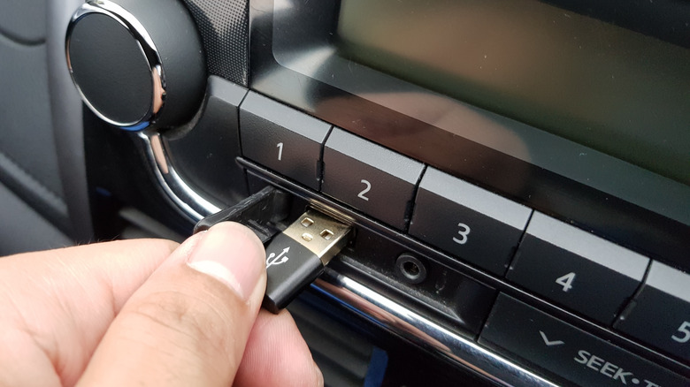 A Sony CDX-GT420U head unit with PNY USB flash drive.
