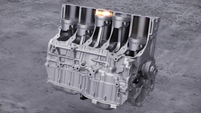 A cutaway of an inline five-cylinder Audi engine showing the firing order