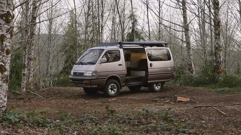 1995 Toyota HiAce at a campsite in the woods