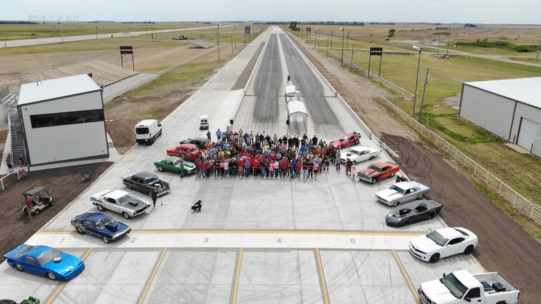 An overhead shot of the new SCRA Dragstrip track as the track workers and supporting community members cut the ribbon for its opening.