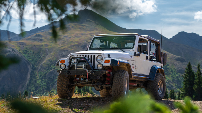 A Jeep off-road near mountains