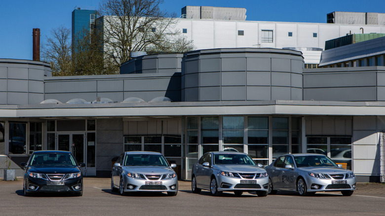 Four of the final available Saab 9-3 cars up for auction sitting in front of the company's Trollh&auml;ttan plant.