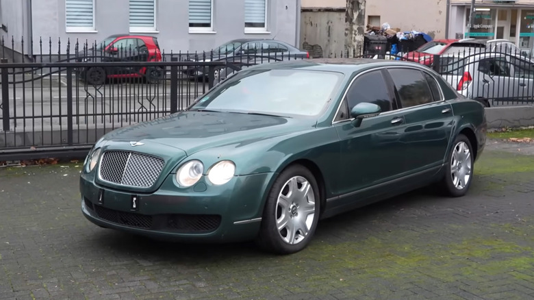 A used green Bentley Flying Spur.
