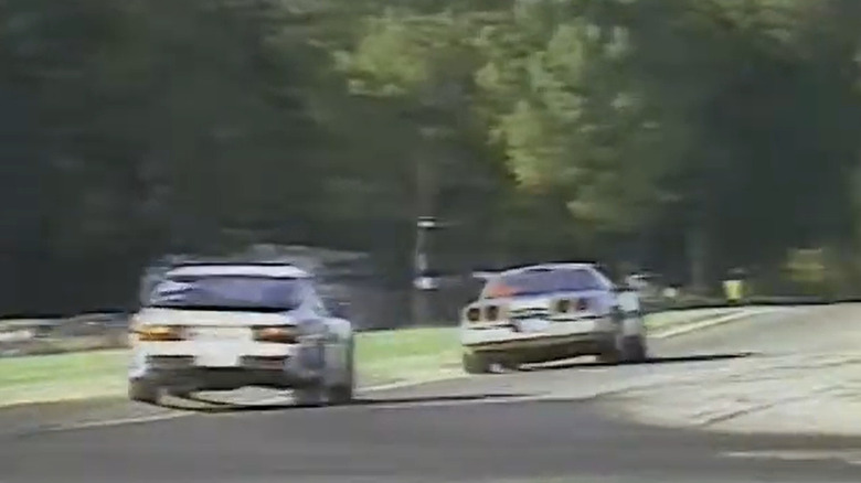 Porsche 944 Turbo chasing a C4 Corvette on track