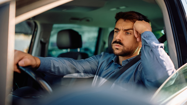 Photo of a driver stuck in traffic