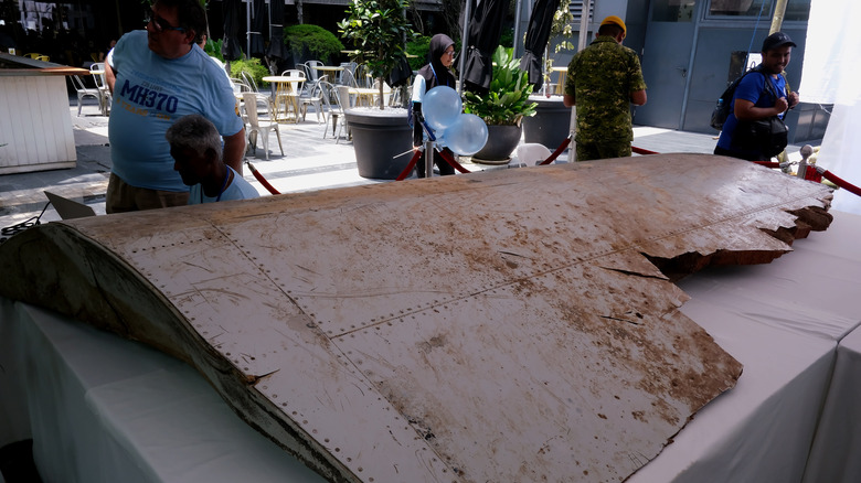 A debris wing flap part of Malaysia Airlines found in Pemba Island, Tanzania display on the table during 5 Years of Remembrance for Malaysian Airlines MH370 event on March 3, 2019 in Kuala Lumpur, Malaysia.