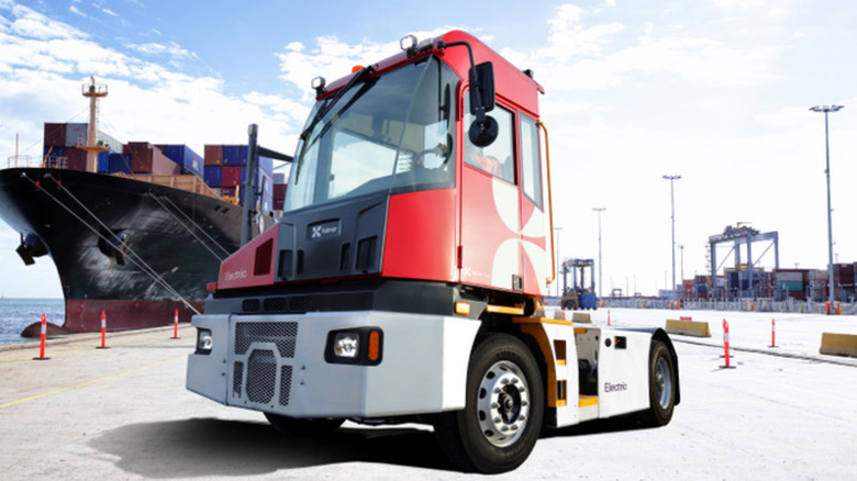 An all-electric Kalmar TT7 terminal tractor at a shipyard