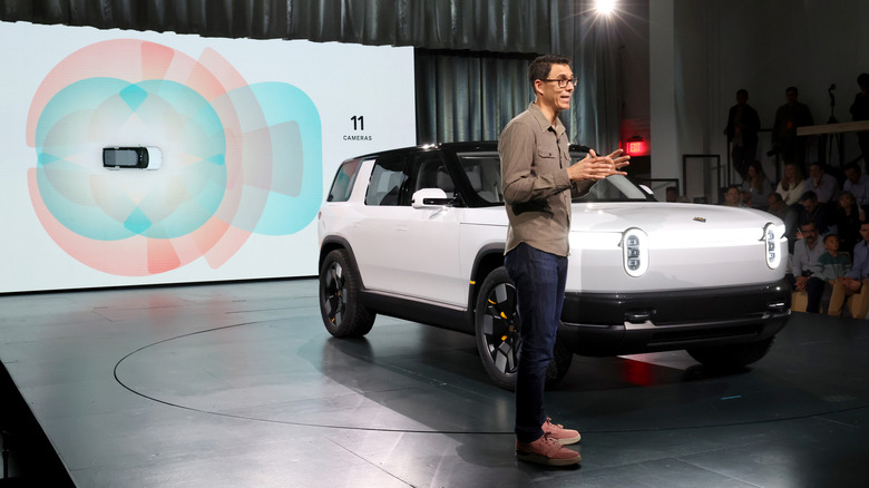 Founder and CEO of Rivian RJ Scaringe speaks onstage during the Rivian Reveals All-Electric R2 Midsize SUV event at Rivian South Coast Theater on March 07, 2024 in Laguna Beach, California.
