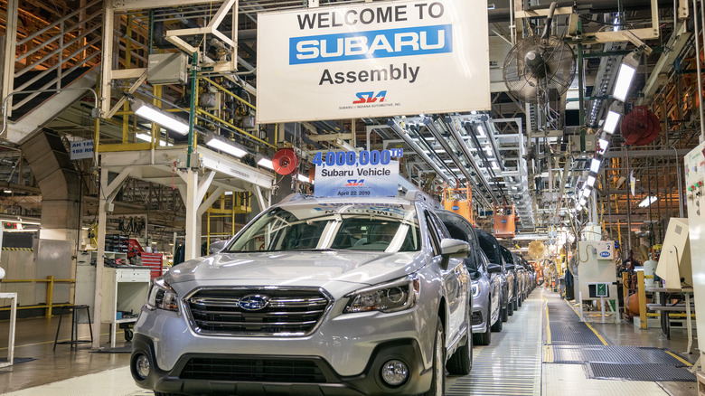 A lines of Subarus are assembled at a factory.