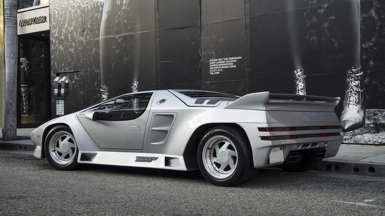 A side profile of a silver Vector W8.