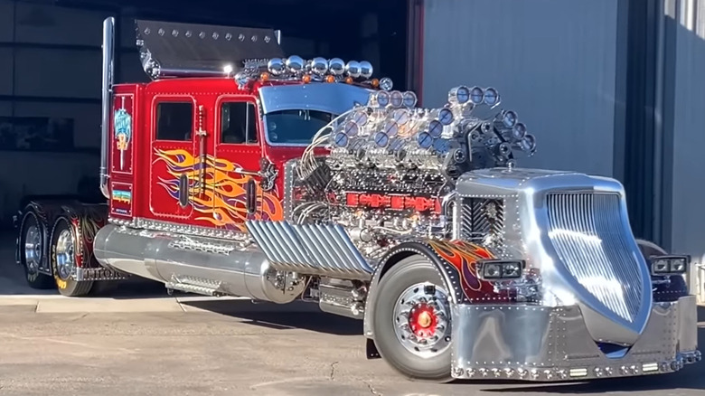 A front shot of Thor24 semi truck pulling out of warehouse