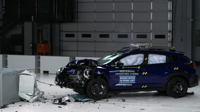 The driver's side profile of 2026 Subaru Crosstrek Hybrid during IIHS crash testing