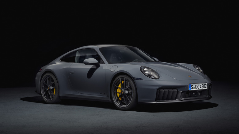 Front 3/4 view of a grey Porsche 911 Carrera GTS