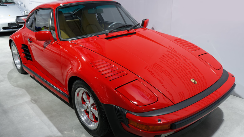 Red Porsche 930 slant nose