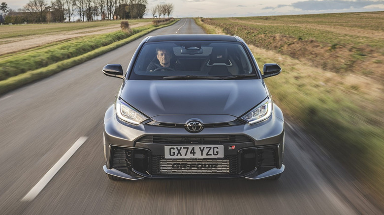 A front shot of a GR Yaris on the road