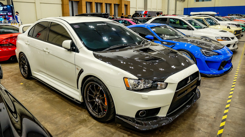 A white Mitsubishi Lancer Evolution FQ440 MR