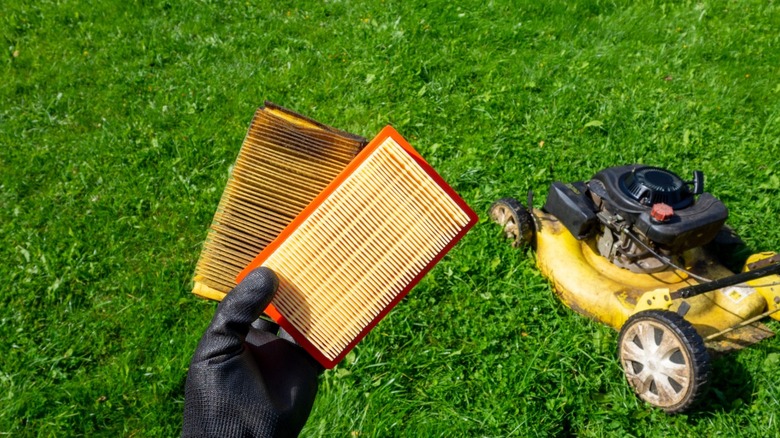New and old air filter for gas-powered lawnmower