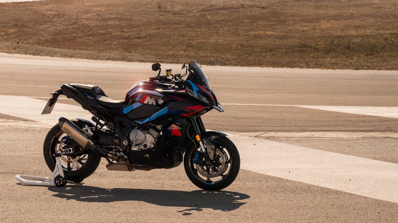 BMW M 1000 XR parked with a center stand at the track