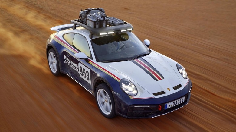 Aerial view of a Porsche 911 Dakar off-roading.