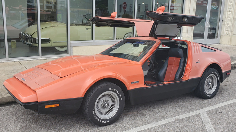 An orange Bricklin SV-1 parked outside Edge Motor Museum in Memphis, Tennessee