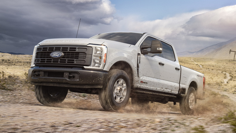 A 2027 Ford Super Duty driving on dirt