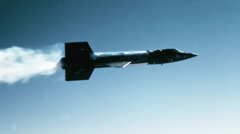 X-15 rocket plane leaving a contrail in the sky.
