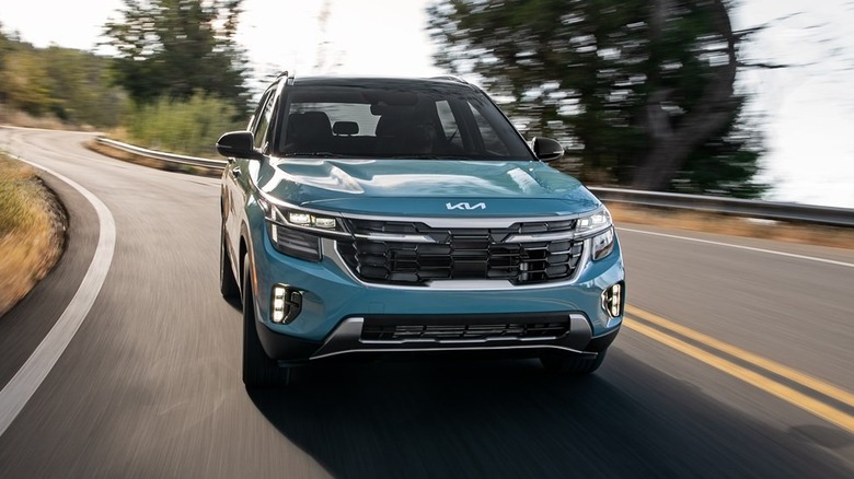 A head-on shot of a 2026 Kia Seltos on a twisty road
