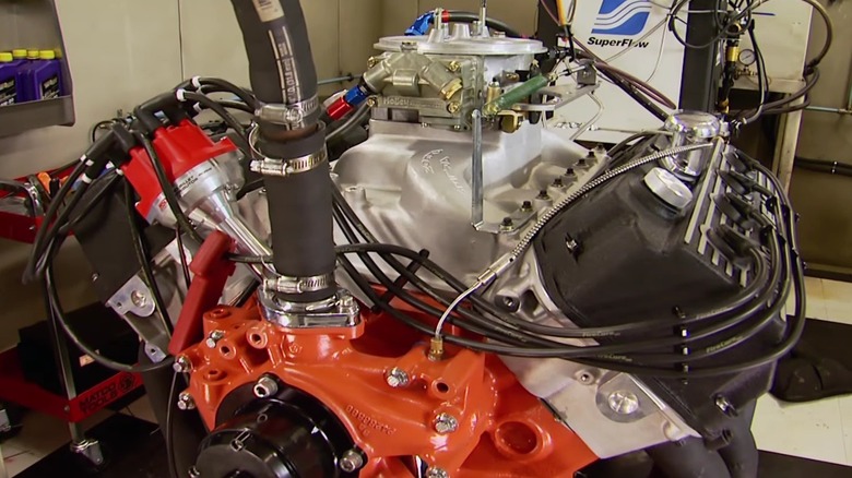 A red and black 572 ci hemi engine on the dyno.