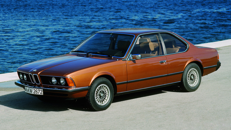 Front 3/4 view of an orange BMW 6 Series