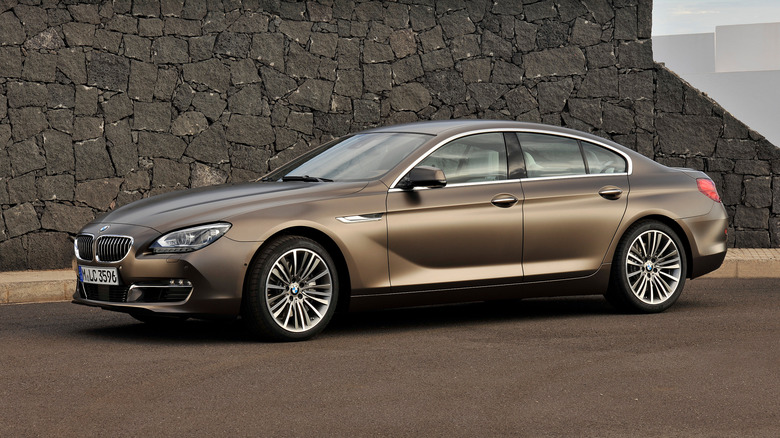 Front 3/4 view of a satin brown BMW 6 Series Gran Coupe