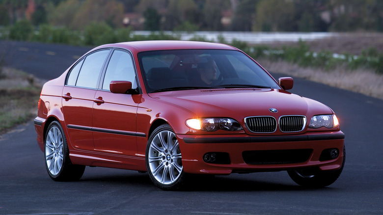 Front 3/4 view of a red BMW 330i ZHP