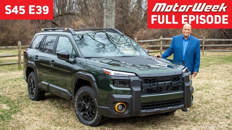 John Davis Standing with a green Subaru in a new episode of MotorWeek