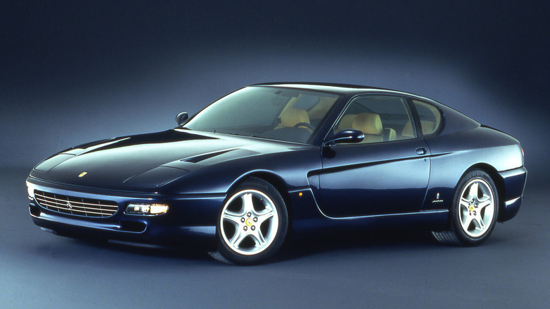 Front 3/4 view of a blue Ferrari 456 GT