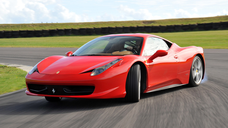 A red Ferrari 458 Italia drifting