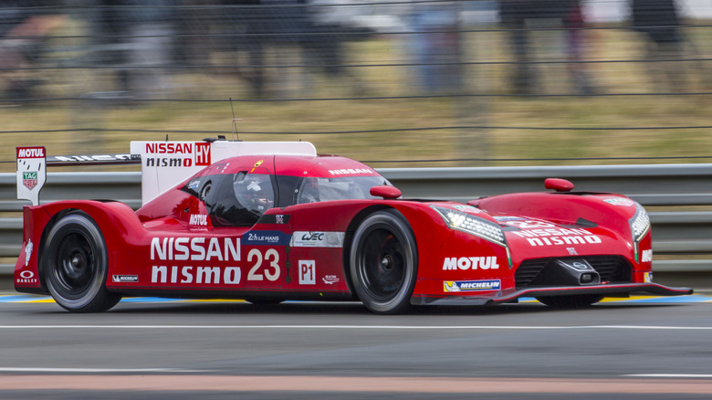 A red Nissan GT-R LM Nismo on track