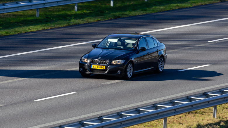 2010 BMW 3 on a three lanes highway