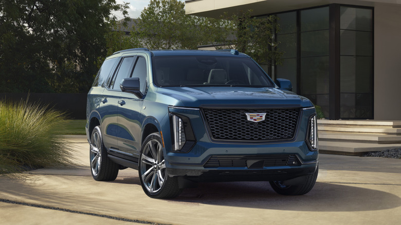 Blue 2025 Cadillac Escalade on display