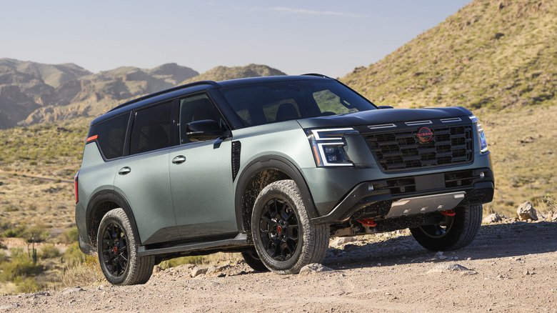 Green 2025 Nissan Armada parked offroad