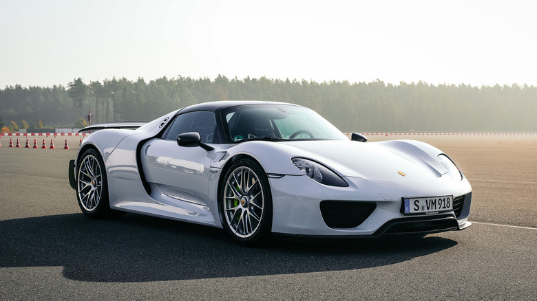 Front three-quarter image of a white Porsche 918 Spyder.