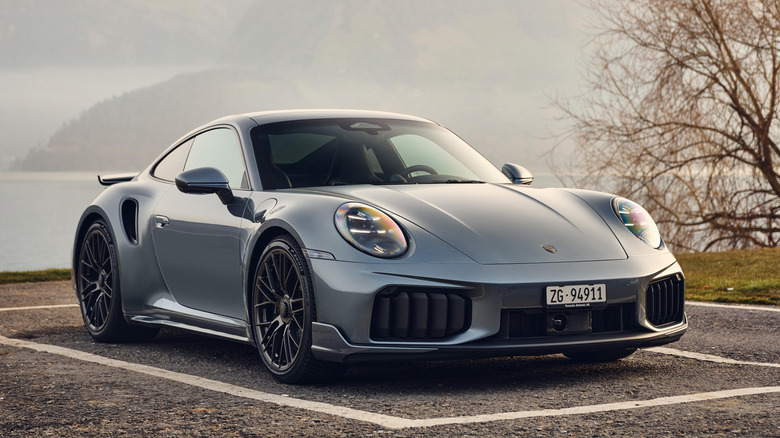 Front three-quarter image of a 992.2 91 Turbo S on a mountain road.
