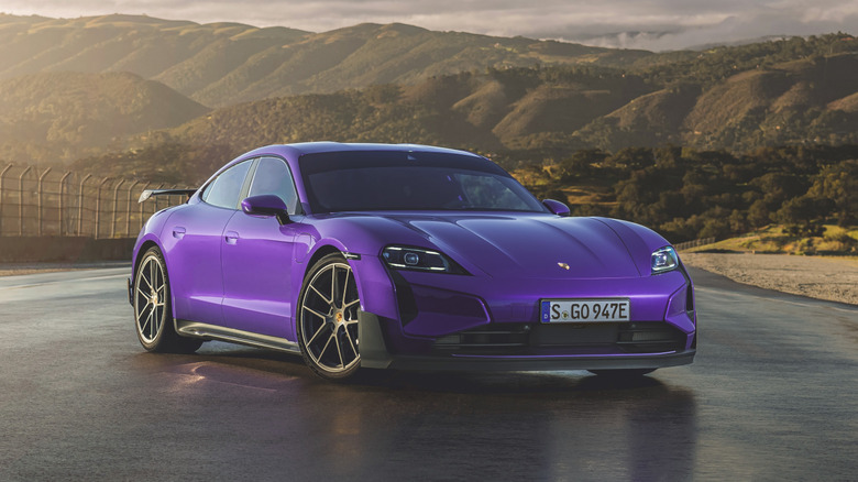 Stationary image of a purple 2025 Porsche Taycan Turbo GT w. Weissach Package.