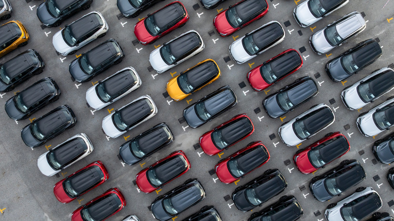 Overhead view of a car dealership parking lot