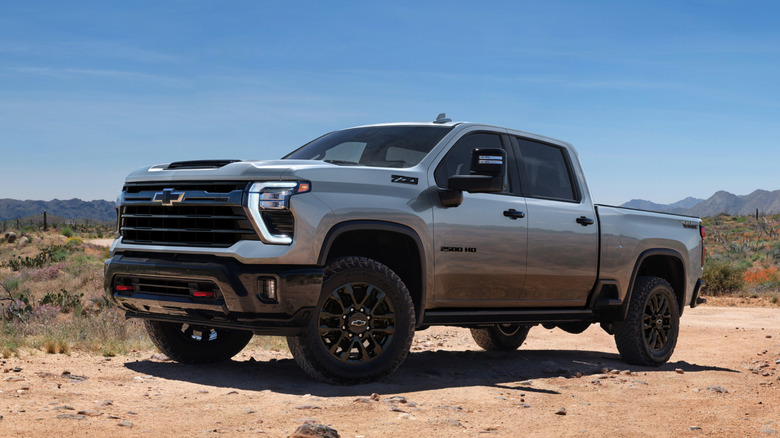 A grey 2026 Chevrolet Silverado HD parked on dirt