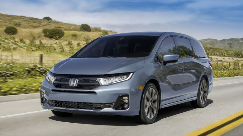 A front 3/4 of Honda Odyssey Elite driving on road